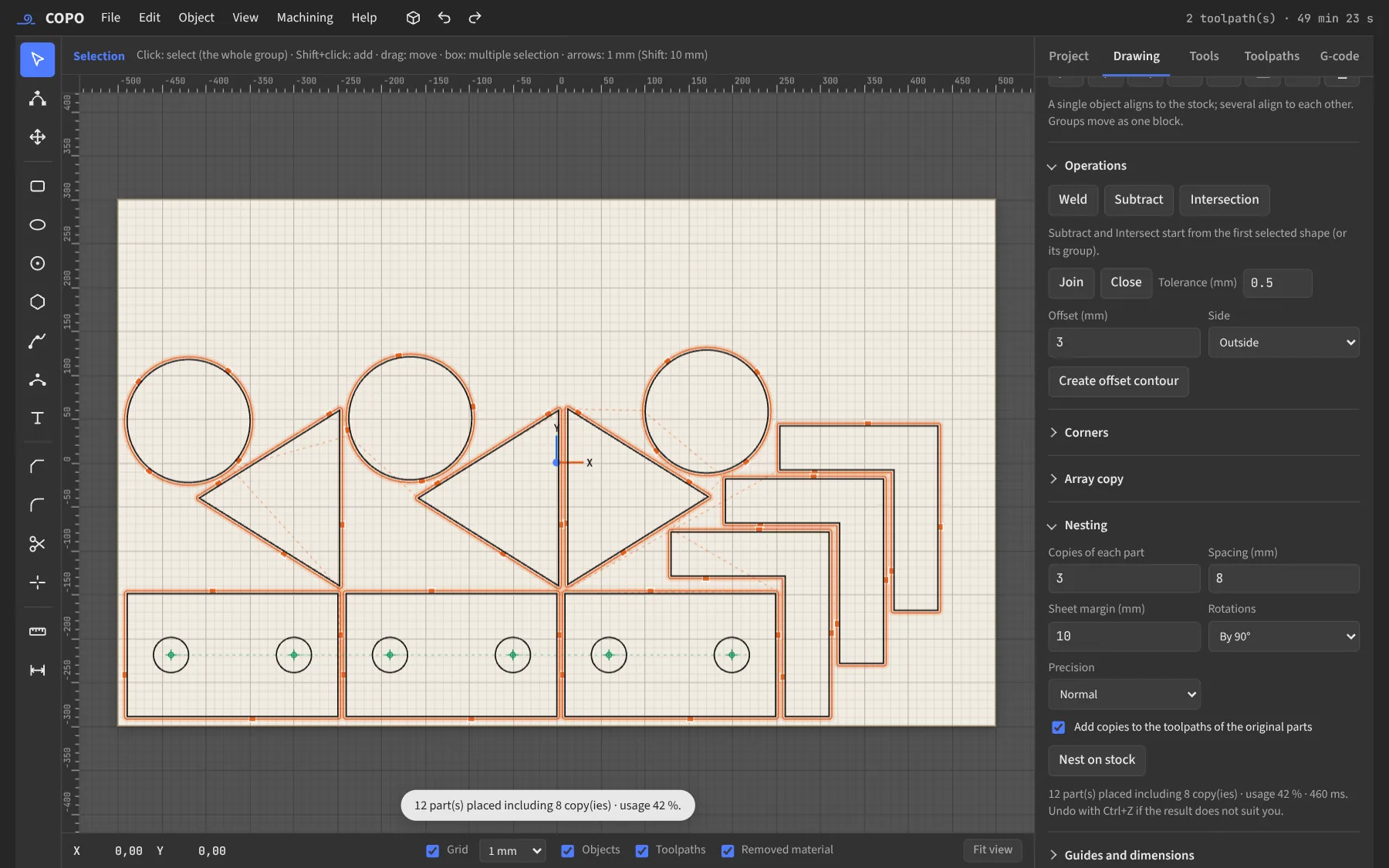 Twelve parts nested on a 1000 × 600 mm sheet, with their cut-out toolpaths.